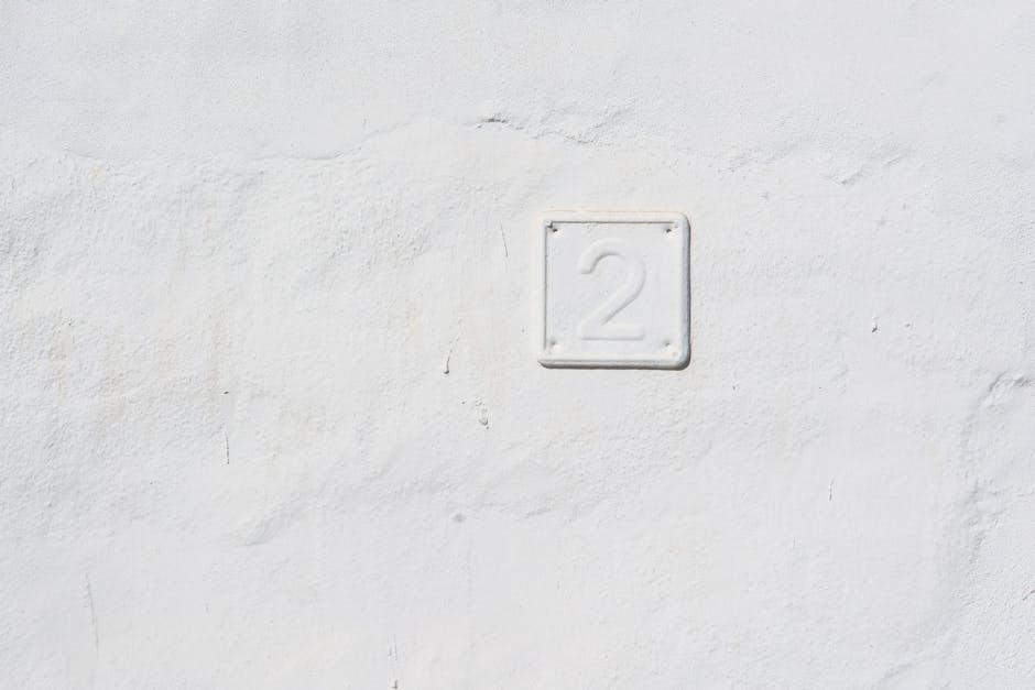 White plaque with number 2 representing simplicity