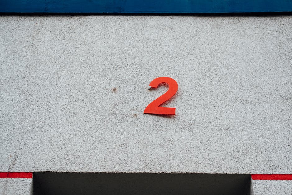 Minimalist orange number 2 representing modern fitness foundations